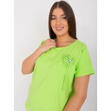 Fashion Hunters Light green oversized women's blouse with trim Cene