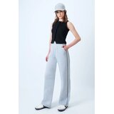 Trend Alacati Stili Ženske široke trenerka pantalone u sivoj melanž boji sa paspul detaljima i elastičnim pojasom Alc-X14611, Sivi melanž / Siva Cene
