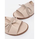 GOODIN Beige flat flip-flops with a bow | Shoptok.si