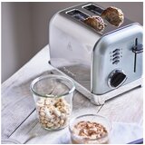 Cuisinart CUCPT160GE
večnamenski toaster 2 rezini, biserno zelena | Shoptok.si