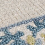 Flair Rugs Modro-slonokoščeno bela ročno tkana preproga iz mešanice volne 160x230 cm Myla Floral Frame – | Shoptok.si