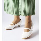 D/CEO Black pumps on a low wedge heel Chantal Cene
