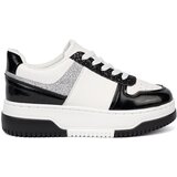 Shelvt Black and white sneakers with shimmering silver details Cene