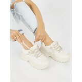 Shelvt Women's beige sneakers Cene