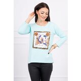 Kesi Blouse with 3D graphics and decorative pom pom-mint Cene