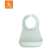 Stokke silikonski slinček munch™ soft mint Cene