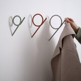 Spinder Design Oranžen jeklen stenski obešalnik Tuba – | Shoptok.si