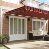 vidaXL Ročna zložljiva tenda oranžna in rjava 600x300 cm | Shoptok.si