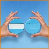 Garnier Ambre Solaire Super UV Invisible Serum SPF50+ serum za zaščito obraza pred soncem 30 ml unisex Cene