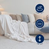 Tiseco Home Studio Belo-bež odeja iz umetnega krzna 150x200 cm Ruby – | Shoptok.si