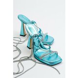LuviShoes Women's Mezzo Metallic Baby Blue Heeled Sandals Cene