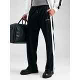 Guess Jeans Spodnji deli trenirke TRICOT TRACK PANT Črna | Shoptok.si