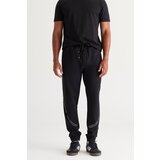 AC&Co / Altınyıldız Classics Men's Black Standard Fit Regular Fit Printed Sweatpants cene