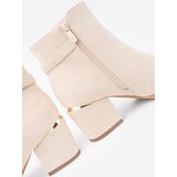 Shelvt Light beige ankle boots on a heel with a decorative buckle | Shoptok.si