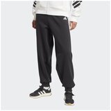Adidas Spodnji deli trenirke W TIRO FL PT Črna | Shoptok.si