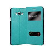 Cadorabo Samsung Galaxy A7 2015 v mint turquoise - Zaščitni ovitek z magnetnim zapiranjem, stoječo funkcijo in 2 okencema za gledanje, (20561196) | Shoptok.si