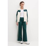Puma Prehodna jakna kremna / zlata / jelka | Shoptok.si