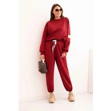 Kesi Włoski Ladies' butter set with a loose sweatshirt and pants with the inscription LOVE maroon | Shoptok.si