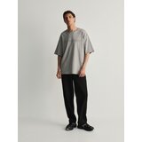 Reserved oversize majica z reliefnim potiskom - svetlo siva Cene