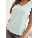 Kesi Women's sleeveless cotton blouse in a classic cut mint | Shoptok.si