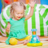 Bright Starts Press & Glow Spinner aktivna igračka s melodijom 6 m+ 1 kom | shoptok.hr