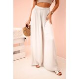 Kesi Włoski Women's wide trousers with elastic waistband beige | shoptok.hr