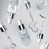 Kiehls Clearly Corrective Dark Spot Solution serum za obraz proti temnim madežem 50 ml za ženske | Shoptok.si