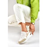 primohurt Sneakersy damskie ze złotym dodatkiem | Shoptok.si