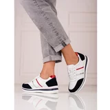 SHELOVET Women's leather sneakers on the platform