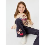Sinsay Pamučne flare tajice Chip & Dale | shoptok.hr