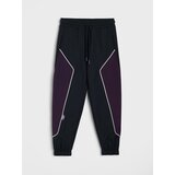 Sinsay Sportske hlače relaxed fit s kontrastnim paspulom Active | shoptok.hr