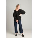 FASHION Black oversize blouse with a decorative flower | ePonuda.com
