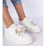 Gemre White sneakers decorated with a bow and a golden teddy bear Karinka | Shoptok.si