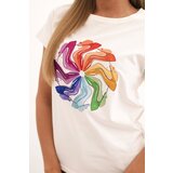 Kesi Women's cotton short-sleeve blouse with a colorful print ecru | Shoptok.si