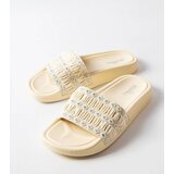 Gemre Ernest's beige slides embellished with ruching | Shoptok.si
