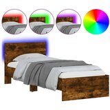vidaXL Posteljni okvir z vzglavjem in LED dimljeni hrast 90x200 cm | Shoptok.si