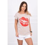Kesi Blouse with beige lip print Cene