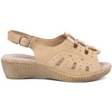 Shelvt Beige sandals with an openwork pattern Cene
