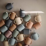 Mushie silikonski lonček s slamico training cup soft lilac | Shoptok.si