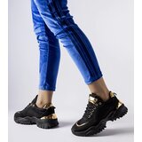 Gemre Black sneakers with gold accent Lodgeville | Shoptok.si