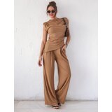 Resti Women's ribbed set with an asymmetrical sleeveless blouse and flared pants | shoptok.hr