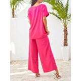 Resti Women's set with short sleeves, decorative flower, and wide trousers | Shoptok.si