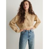 Reserved pulover iz kombinacije materialov - bež | Shoptok.si