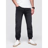Ombre Men's denim joggers with asymmetrical stitching - blue Cijene