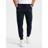 Ombre Men's sweatpants with decorative zippers - navy blue Cene
