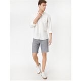 Koton Shorts - Navy blue - Normal Waist Cijene