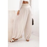 Kesi Włoski Women's viscose trousers with wide leg and ruffles beige | shoptok.hr