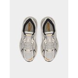 Saucony Niske tenisice 'PROGRID GUIDE 7' ecru/prljavo bijela / tamno narančasta / crna | shoptok.hr
