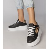 Gemre Black sneakers with a heart pierced by a pin Lerisol | Shoptok.si