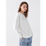 LC Waikiki Women's Crew Neck Embroidered Long Sleeve Oversized Sweatshirt. Cene